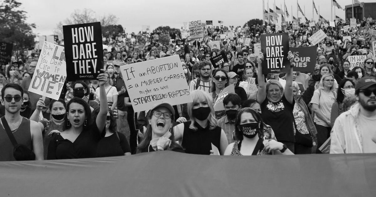 Hundreds in U.S. march below ‘Ban Off Our Our bodies’ banner for abortion rights