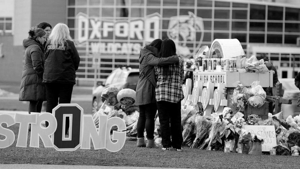 Victims, dad and mom of Oxford faculty taking pictures victims sue college employees